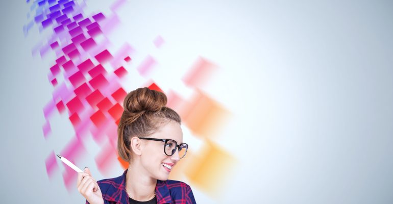 Smiling,Geek,Girl,In,Glasses,Wearing,Checkered,Shirt,Sitting,Near